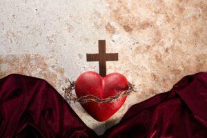 Sacred Heart of Jesus, surrounded by a crown of thorns and with wooden cross